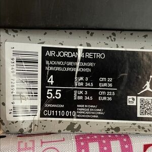 Jordan Air 4 Retro Black and Gray Sneakers